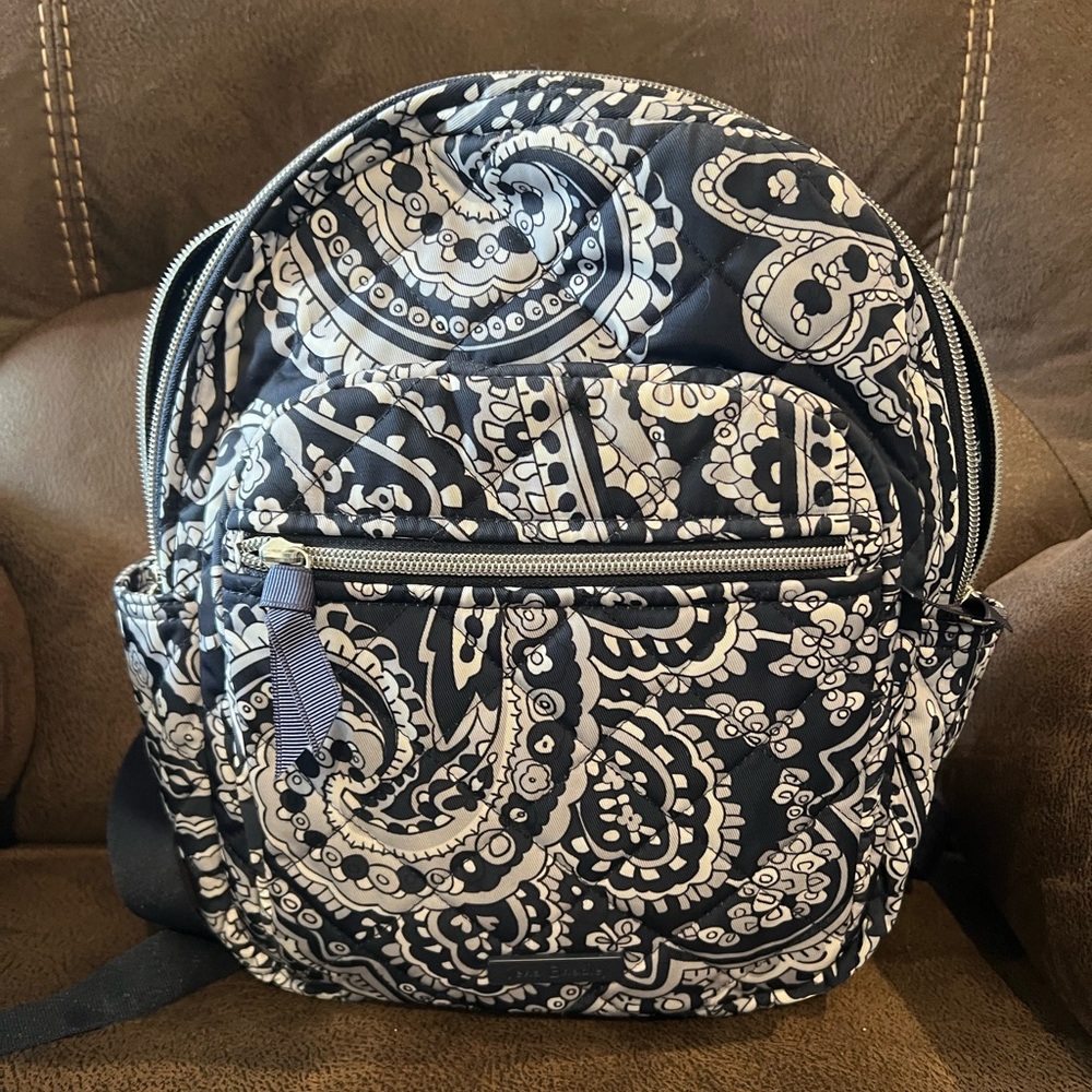Vera Bradley small backpack with matching wallet.